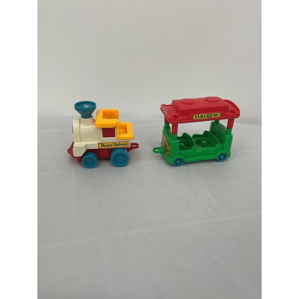 Vintage 80s Lil Playmates Disney Mickey Mouse train engine and passenger car.